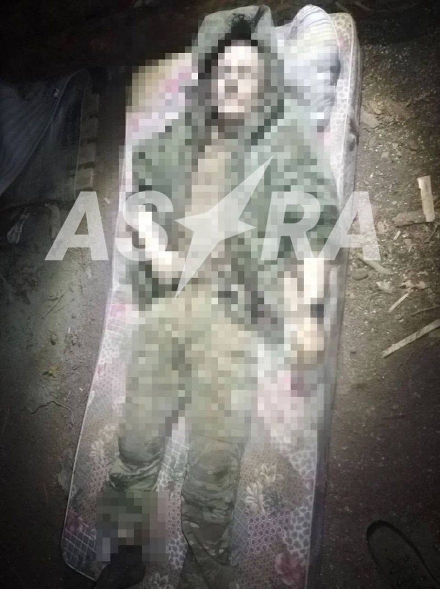 visegrad24's tweet photo. Russian soldiers beat their fellow soldier to death with a giant rubber dildo

Russian soldier Dmitry Poloymov, callsign “Fizruk,” was kept chained to a wooden post for several days while being abused. His fellow servicemen then took a giant dildo and beat him to death.

The widow of the murdered Russian soldier received her husband back in a “sealed coffin” accompanied by a document claiming he died of “heart failure.”

When the murder came to light, Russian commanders tried to cover it up. 

The main suspects were Dmitry’s comrades with callsigns “Iva” and “Skys.” During the investigation, their commander sent them on a “meat assault,” after which one was killed and the other wounded.

The commander himself had previously been accused of kidnapping people, abuse of power with torture, and murder.