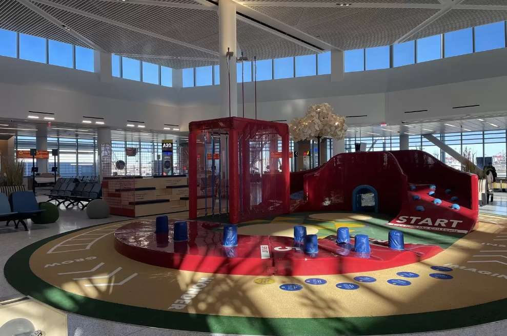 reasonable_duck's tweet photo. @bowtiedgerman Newark’s news terminal has a small American ninja warrior style play area. It was delightful chaos. Survived a 4+ hr international layover.  

They just need to have a beer stand next to it now. https://t.co/G6SWACgf5a