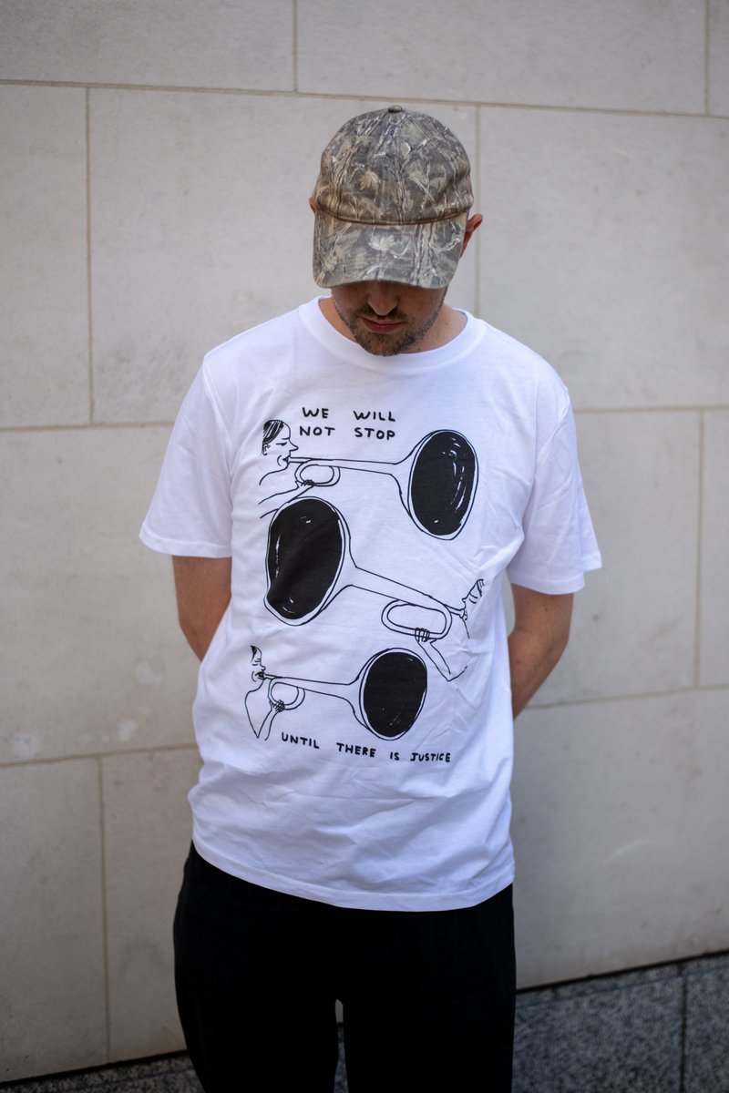 JUSTICEhq's tweet photo. 🎺@davidshrigley has designed a T-shirt for us!   

As our work to defend jury trials continues, one thing is clear: 'We will not stop until there is justice.'

All proceeds support our efforts to build a fairer justice system for everyone.

Get yours: https://t.co/PpwVpcfVp9 https://t.co/ZwcDEGI09P