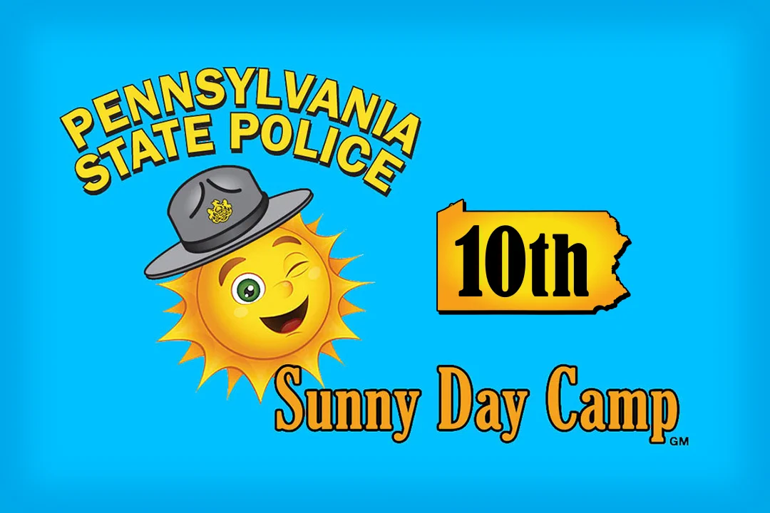 A cartoon sun wears a Pennsylvania State Police campaign hat while smiling and winking, an outline of Pennsylvania with the ordinal number 10th, plus the words Pennsylvania State Police Sunny Day Camp