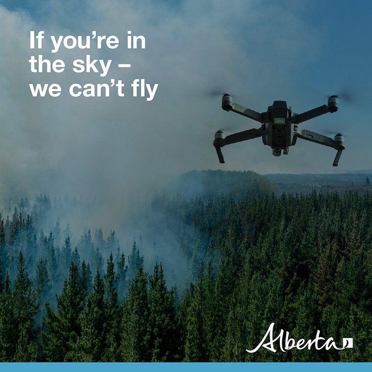 AlbertaWildfire's tweet photo. The use of recreational drones over wildfires in Alberta is illegal. Please give our firefighters the space they need to do their jobs safely. For more information, visit https://t.co/2RM82VIiK1 https://t.co/6h4155ifpU