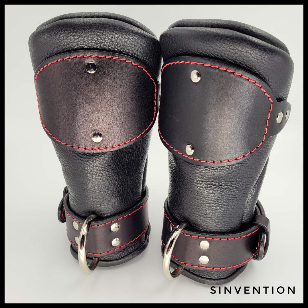 SinventionGear's tweet photo. Sinvention fist mitts are fully padded, feature a still leather palm guard and locking wrist straps. Choose to add dees to the end of the mitts for more bondage possibilities 💫 #bondagegear #bdsm #slave #sinvention https://t.co/h9VRpy0bSO https://t.co/lDW7xFVGcV