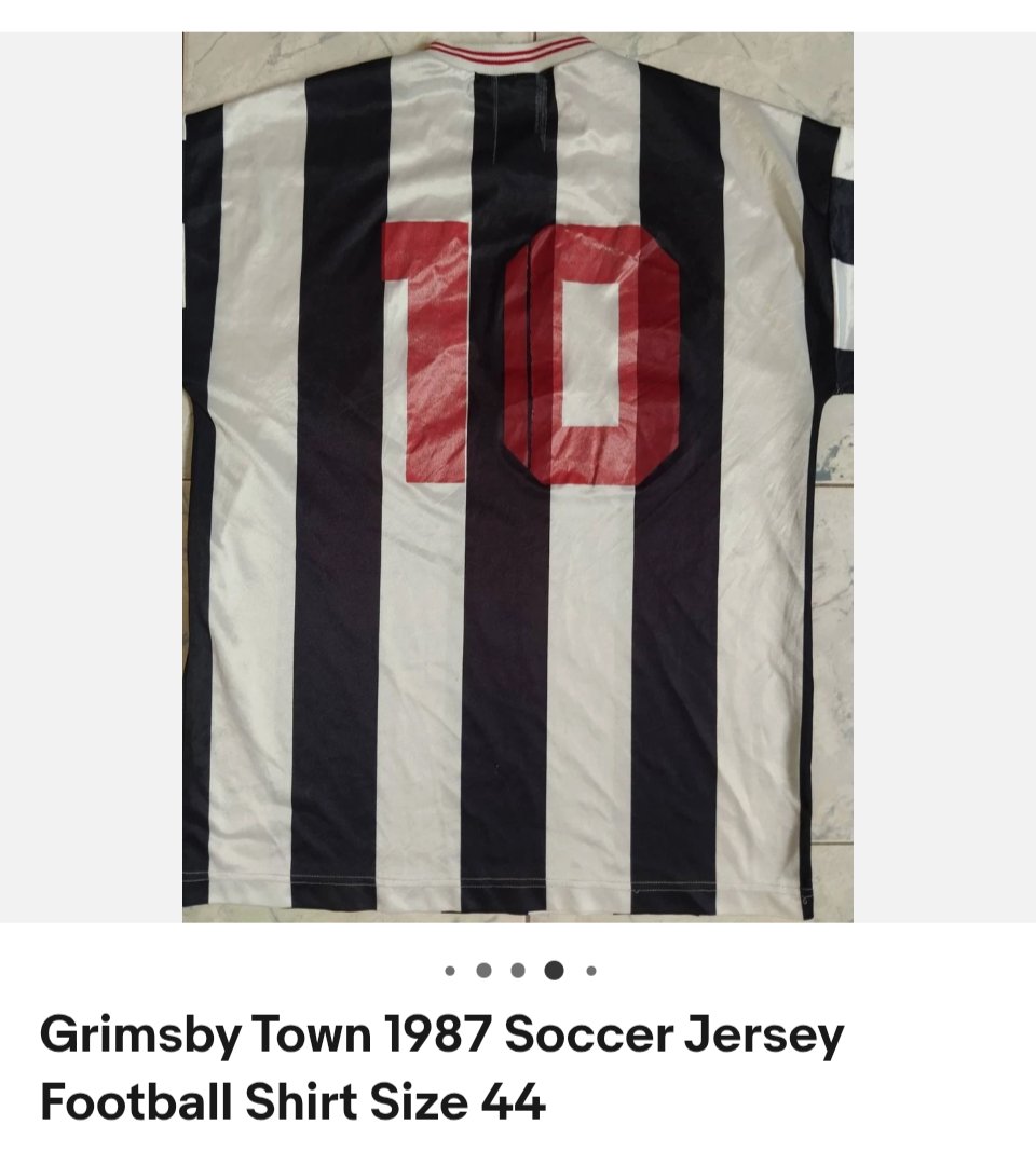 codalmighty's tweet photo. A proper #gtfc eBay rarity spotted today listed from Thailand 😯. A player shirt from the 1987-88 season when the EN-S logo and Town badge swapped sides. @MarinerMen @GTFCshirts https://t.co/4fzoF4617S