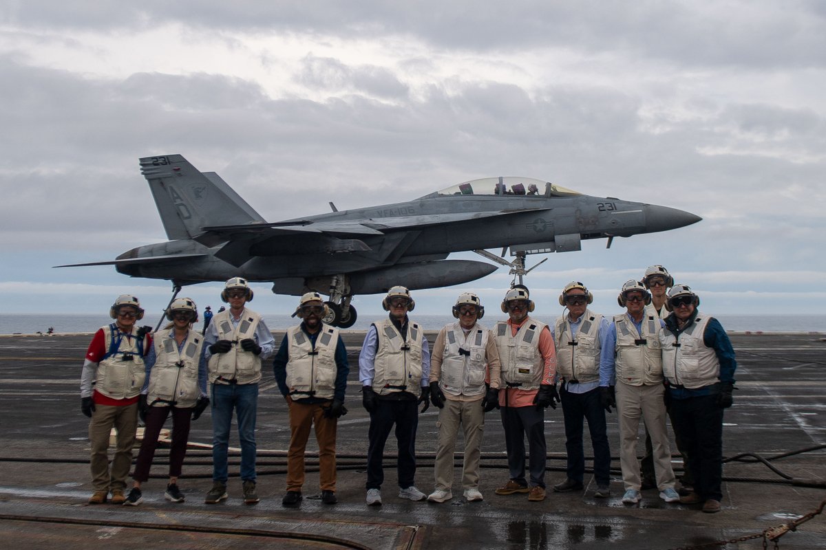 NavalWarCollege's tweet photo. U.S. Naval War College faculty, John Hanus of the Center for Naval Warfare Studies' Wargaming Department, David Ainslie and Michael Troy Rittenhouse of the College of Maritime Operational Warfare, recently had the opportunity to embarked aboard the USS Dwight D. Eisenhower. https://t.co/GsiIWJkin4
