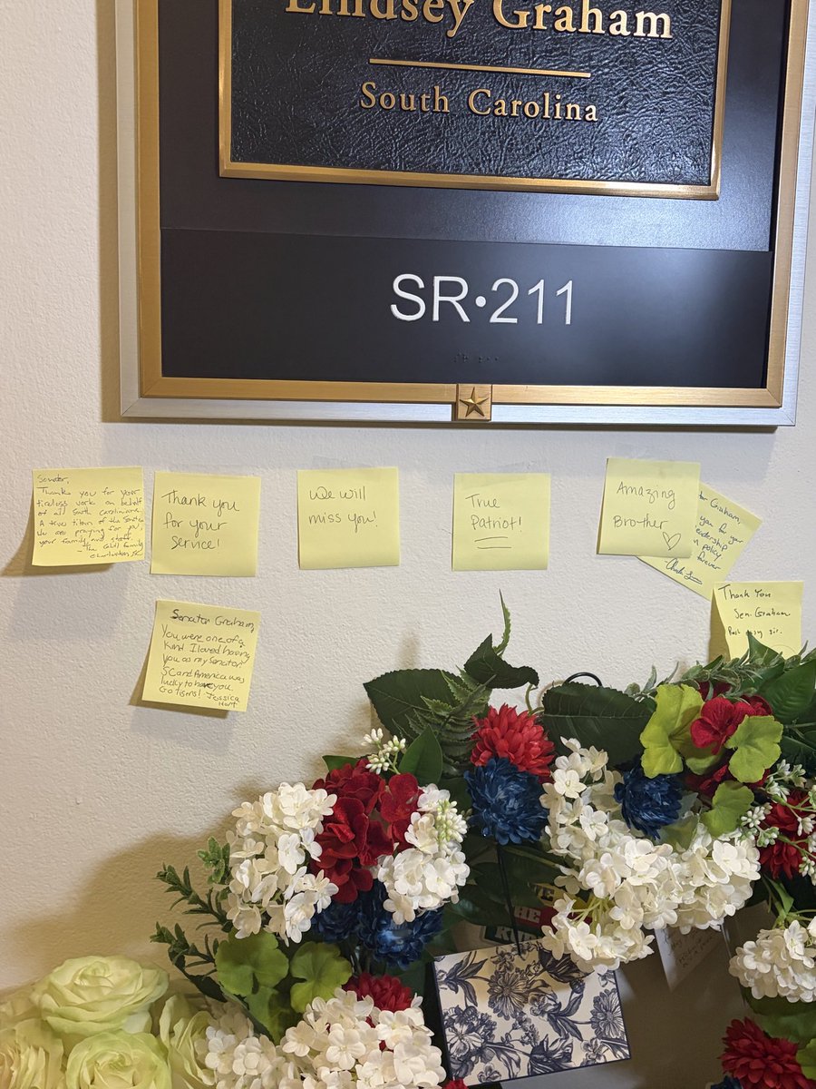 NicoleMSilverio's tweet photo. A memorial for Lindsey Graham outside his office in the Russell Senate Building 

@DailyCaller https://t.co/IqeHbtYsr2