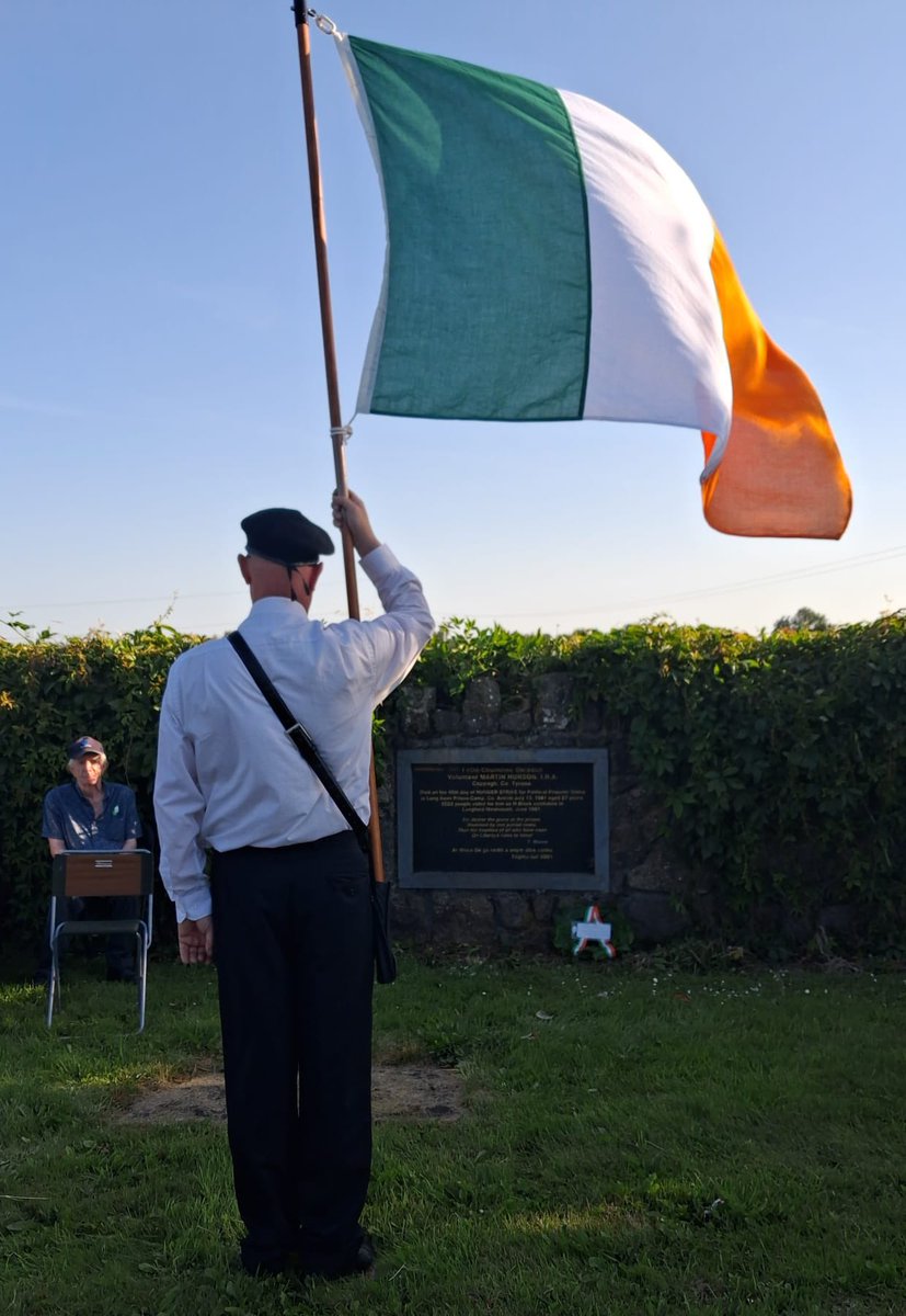 RepublicanSF's tweet photo. On Sunday, July 12th, at 7pm, republicans from Longford, Westmeath, Roscommon and Cavan assembled at the Martin Hurson Memorial at the entrance to Mostrim train station to mark the 45th anniversary of young Martin's death on hunger strike on the 13th of July 1981.

Paddy Dolan chaired the event. The 1981 Hunger Strike Roll of Honour was read out by Brenda Kenny, the County Longford Roll of Honour by Tracey Tully, and Kieran Lennon read the County Westmeath Roll of Honour. Shay Kiernan read the 1916 Proclamation.

Wreaths were laid on behalf of the Martin Hurson Memorial Committee and Sinn Féin Poblachtach Longford-Westmeath by Stephen Fullham, by Shay Kiernan on behalf of the Casey-McCreesh Cumann, and by Kieran Lennon on behalf of the Seán Costello-Martin Hurson Cumann. The flag was dipped to the playing of the Last Post.

Uachtarán Seosamh Ó Maoileoin stood in and gave the oration, as the original speaker was unable to attend. He spoke about the great sacrifice of Martin and his comrades, and how the news of Martin's death was such a shock to him and his comrades who were incarcerated in Portlaoise Gaol at the time. Finishing his oration, he called for more support to be given to the republican movement so as to bring forward the day of Irish freedom.
