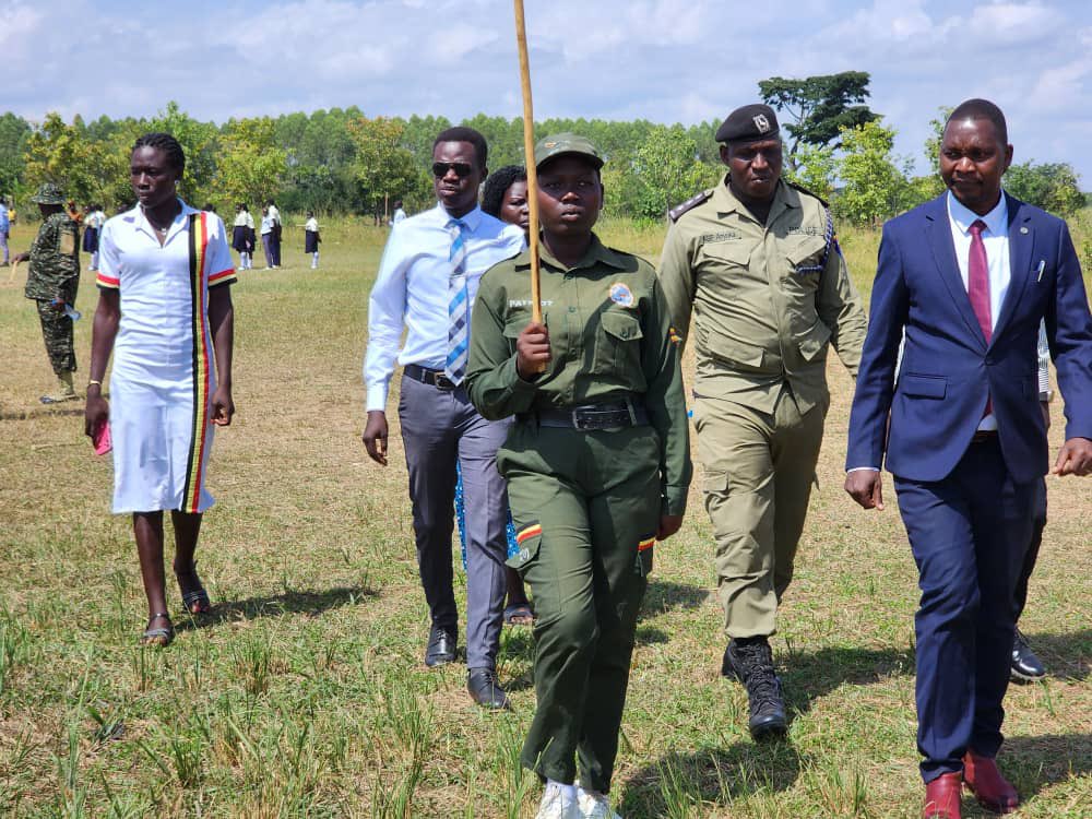 EseruPaul's tweet photo. With Continuous patriotism, we shall be raising a generation that will safeguard Ug’s Peace, Unity &amp; Prosperity. 
Thank you HE @KagutaMuseveni and commissioner patriotism Hon. @HelenSeku for entrusting me with this role. I passed them out on your behalf. Long live Mzee https://t.co/90A2lrC6Tt