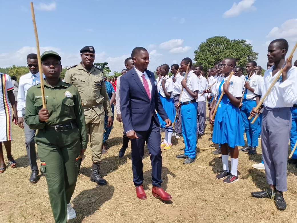 EseruPaul's tweet photo. With Continuous patriotism, we shall be raising a generation that will safeguard Ug’s Peace, Unity &amp; Prosperity. 
Thank you HE @KagutaMuseveni and commissioner patriotism Hon. @HelenSeku for entrusting me with this role. I passed them out on your behalf. Long live Mzee https://t.co/90A2lrC6Tt
