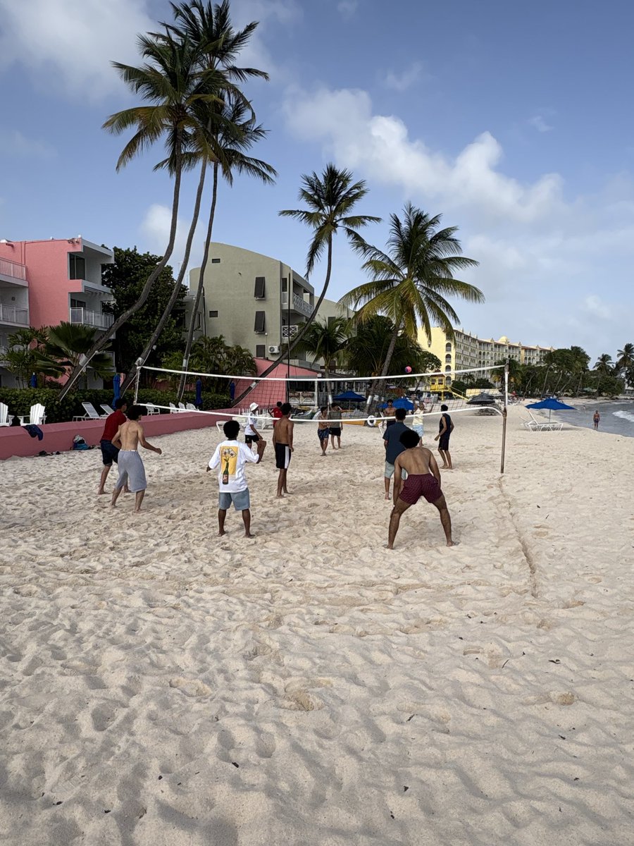 WilsonsPE's tweet photo. 🇧🇧🏏- Day 1- Training session at the Franklyn Stephenson Academy where we were lucky enough to meet the great man himself. Afternoon at the beach included volleyball, vortex games and swimming in the sea. Dinner this evening before we play our first game tomorrow. 🟡⚫️🏏 https://t.co/Kf5oaxGijV