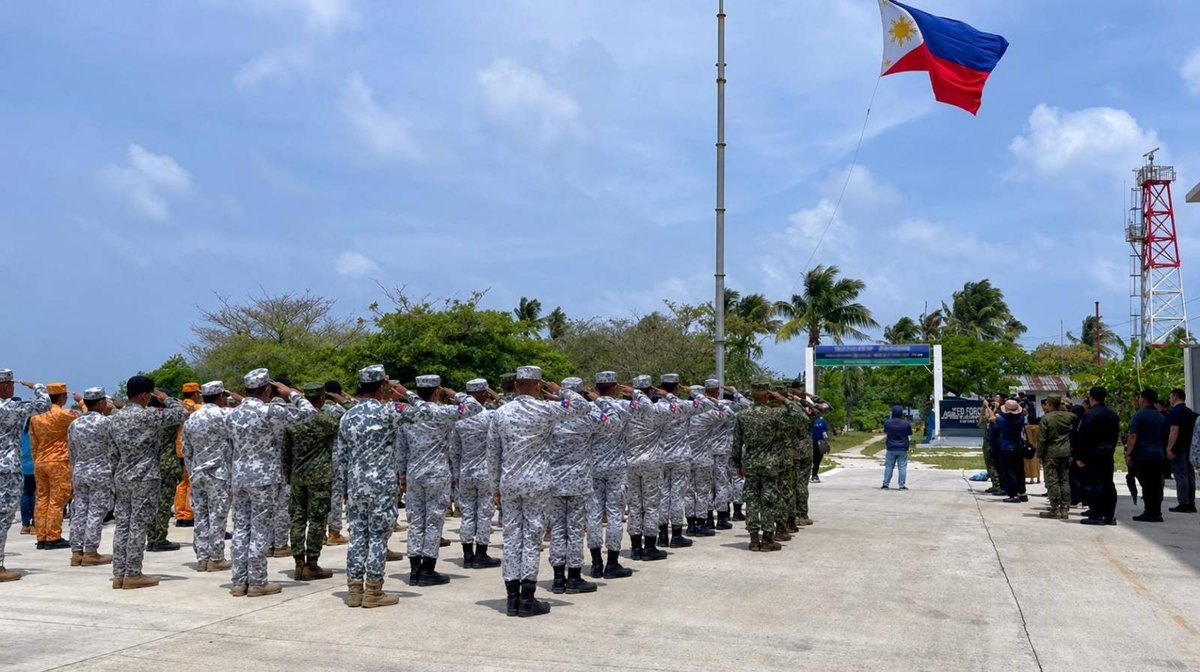 TOWWestPAF's tweet photo. 🇵🇭 United for the West Philippine Sea

The Tactical Operations Wing West joined the flag-raising ceremony on Pag-asa Island in commemoration of the 10th Anniversary of the 2016 Arbitral Award, led by Secretary of National Defense Gilberto C. Teodoro Jr. https://t.co/6LYcGMUgUt