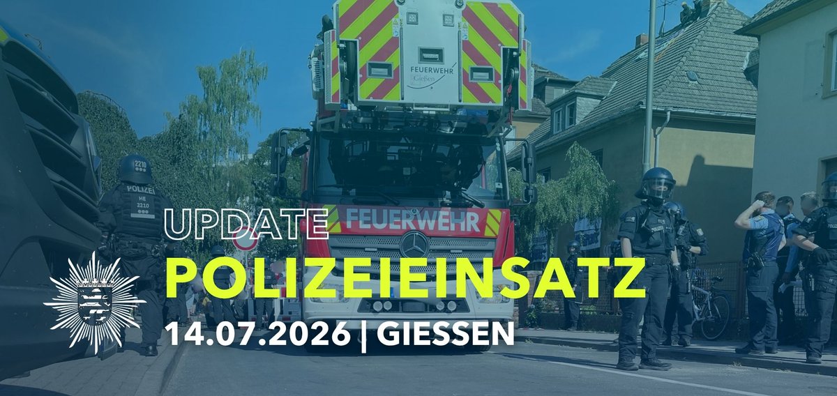 Feuerwehrfahrzeug mit Drehleiter und Polizeibeamte. Text: Update Polizeieinsatz 14.07.2026 Gießen