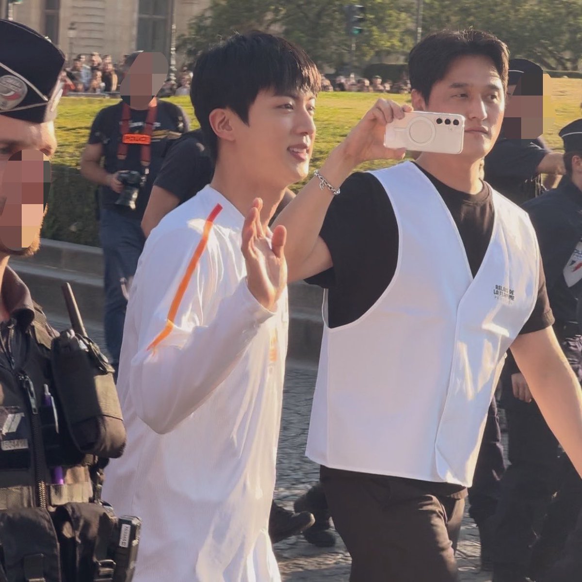nichomoon02's tweet photo. it’s officially been two years since jin came to paris for the olympic torch relay, i’m still so proud of him 
two whole years since that magical day and everything that followed 🥹

honestly the me from two years ago could’ve NEVER imagined all of this happening, and i will be forever grateful that he came here and actually heard my words 🤍seriously still feels like a dream

happy 14th of july! the fact that seokjin is back in paris today of all days just brings back so much joy. 
thank you nini i love you so much, thank you for making me feel like the luckiest girl in the world