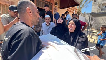 Hadeeth55's tweet photo. The heartbreaking farewells never seem to end. These are scenes from the farewell to 10-year-old Moataz Marwan Abu Shaar, who was killed a short while ago after being shot by Israeli forces in the Al-Mawasi area of Rafah. The bullet struck him directly in the heart, resulting in his death.