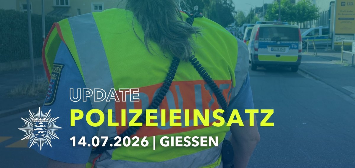 Rückansicht einer Polizeibeamtin in Polizeiweste. Text: Update Polizeieinsatz 14.07.2026 Gießen