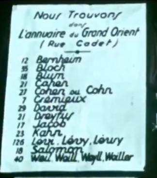 NBouvierOff's tweet photo. En 1973, un reportage a été tourné au GODF : https://t.co/VmLJ1yeots  (merci @ZippoJeje pour les archives).

Fred Zeller, Grand Maître du Grand Orient de France, explique les principes et les symboles de la Maçonnerie.
A la fin du reportage, les dernières secondes sont les plus "incroyables, dont voici les images.

L'annuaire du Grand Orient est composé de noms juifs (Dreyfus, Jacob, David, Crémieux, Bloch...), disant également que "la haute banque juive est maçonnique".

Sur la musique de "Maréchal, nous voilà", sous le buste de Marianne (symbole Maçonnique), un écriteau est intitulé "L'aveu", révélant la fierté des Francs-Maçons d'être à l'origine de la "Révolution bourgeoise de 1789", "La Révolution émeutière de 1848" et "la guerre de 1870".

"Tous les manuels d'Histoire du monde n'ont jamais été que des livrets de propagande au service des gouvernements" Marcel Pagnol.