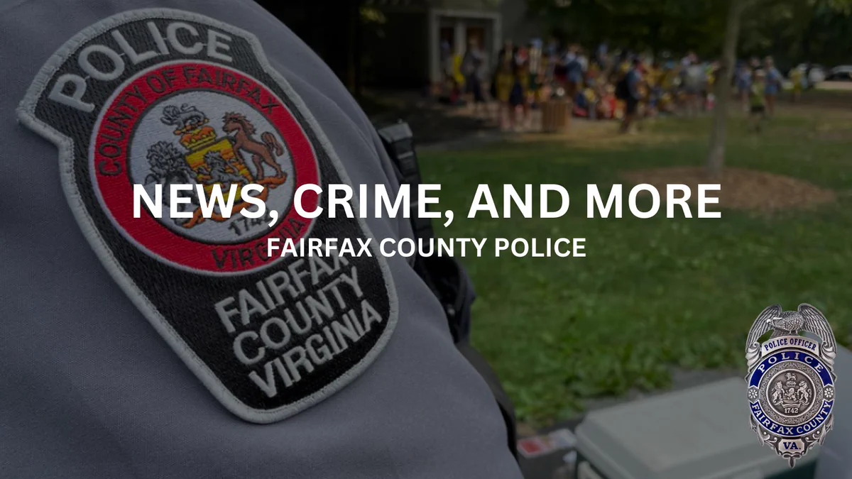 Close-up of Fairfax County Police uniform patch with blurred community event in the background.