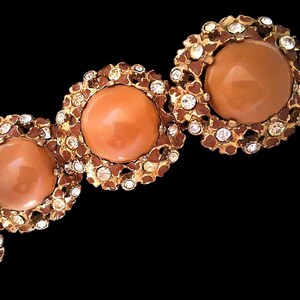 renaissancefai's tweet photo. Vintage Kafin New York Domed Peach/Caramel Glass Cabochon Bracelet w/Floral & Clear Rhinestones
https://t.co/kR0GPUSMOv?
#bracelet #vintage #KafinNewYork #cabochons #domed #peach #floral #clearrhinestones #collectible #midcentury #1950s #1960s #designer #signed #goldtone #chunky https://t.co/eUgWQ4ZSCZ