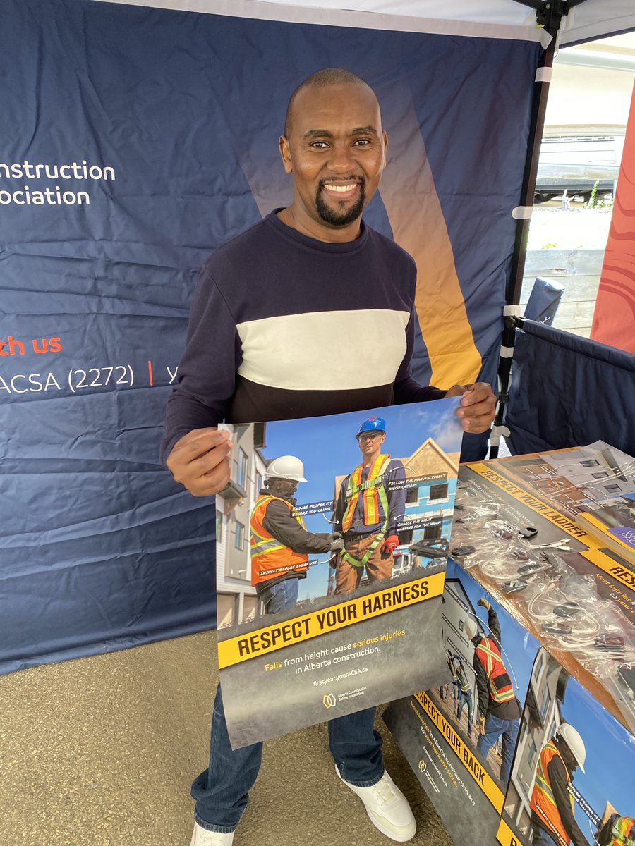 OfficialACSA's tweet photo. Spotted at the Calgary Construction Association Stampede BBQ: A familiar face from our first-year worker safety campaign!
 
ACSA instructor Sam Wambugu, featured in our Respect Your Harness poster, was spotted with one of our industry members. It was a great reminder that practical resources can help spark conversations and build safer habits from day one.
 
Free poster, inspection checklist & CSTS video: https://t.co/C15ksIhMRo