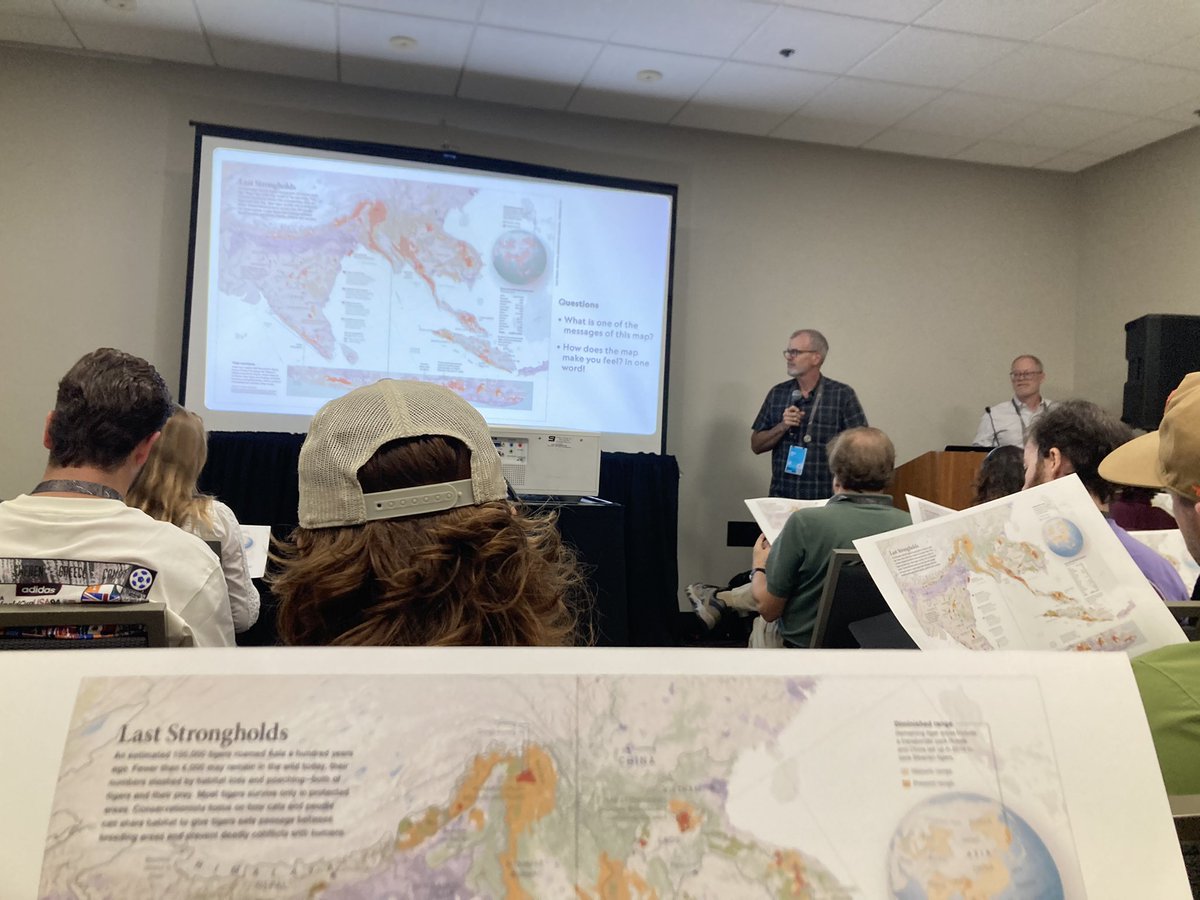 lucygeog's tweet photo. #EsriUC2026 @NatGeo staff are walking the audience thru storytelling with maps with large map handouts! https://t.co/dAErdK18ha