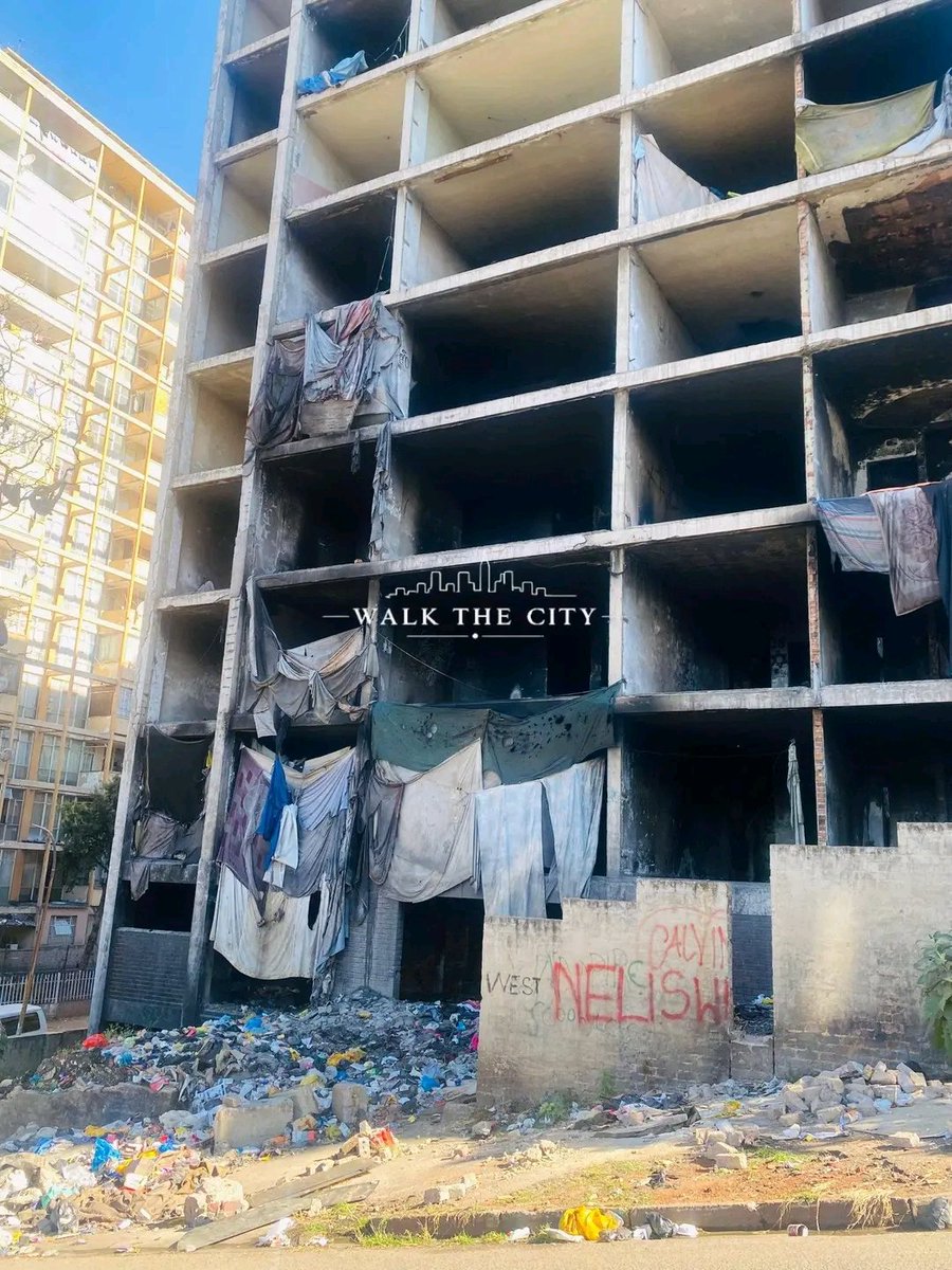 jackson_rem's tweet photo. 𝗕𝗘𝗥𝗘𝗔

This is 𝟯𝟭 𝗟𝗶𝗹𝘆 𝗔𝘃𝗲𝗻𝘂𝗲 in Berea  Johannesburg a building that was hijacked in 2001 by illegal Nigerian criminal syndicates.

By 2010 the building was in a bad state.. occupied by drug addicts... the owner tried to renovate and bring it back to life but unfortunately it had owed the City of Joburg millions of Rands in unpaid rates.

2019 Covid hit South Africa and it was hijacked again and experienced a series of fires which engulfed the entire interior and basement. There are currently no plans to resuscitate it.

It stands derelict and dilapidated like many others in Berea, Hillbrow and Yeoville.