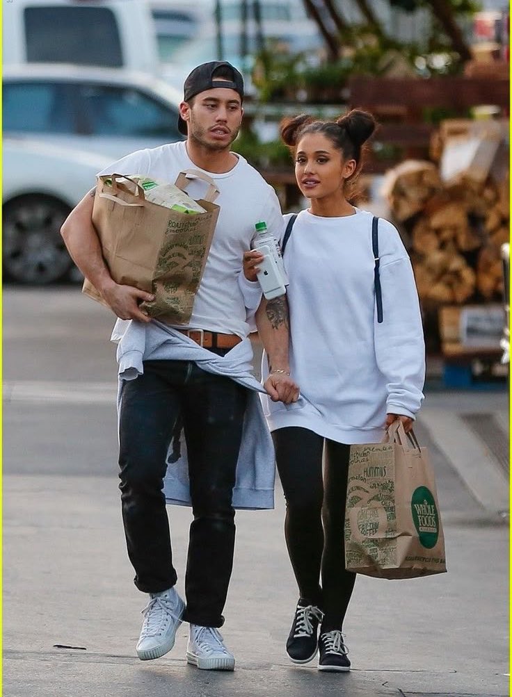 PoppPulse's tweet photo. Ariana Grande is  back together with ex-boyfriend Ricky Alvarez the Argentine footballer, just  weeks after her breakup with Ethan slater. https://t.co/xJVzmYmB0v