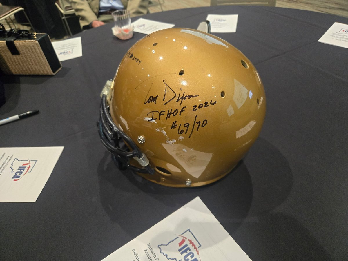 SidelineSwami1's tweet photo. Congrats to former Bishop Dwenger and Michigan football great Tom Dixon on being inducted into the Indiana HSFB Hall of Fame. Thanks to GameNight correspondent Matt Hatfield for getting this Saints helmet autographed for my cave. #BDFB #IFCA #UMFB https://t.co/1sUwuBAwQK