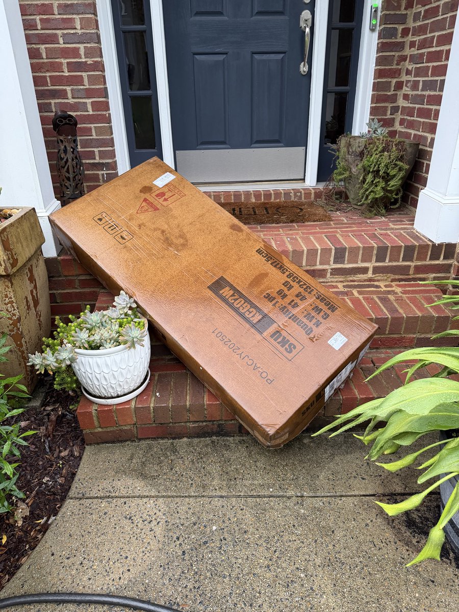 GAHomeMatch's tweet photo. @FedEx @FedExHelp 

$50 to ship and this is how you leave it in the middle of a downpour. Got home 7 minutes after you delivered (saw on doorbell how you left out and ran home). Yes, it’s completely ruined, pressboard wood already swelling. https://t.co/cg6Da6k8mT