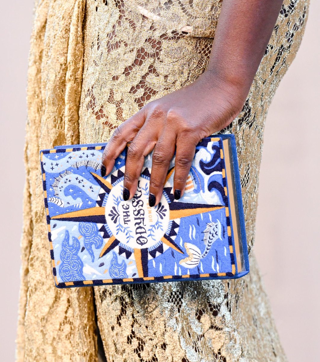 The choker & the Olympia Le-Tan “The Odyssey” book clutch really