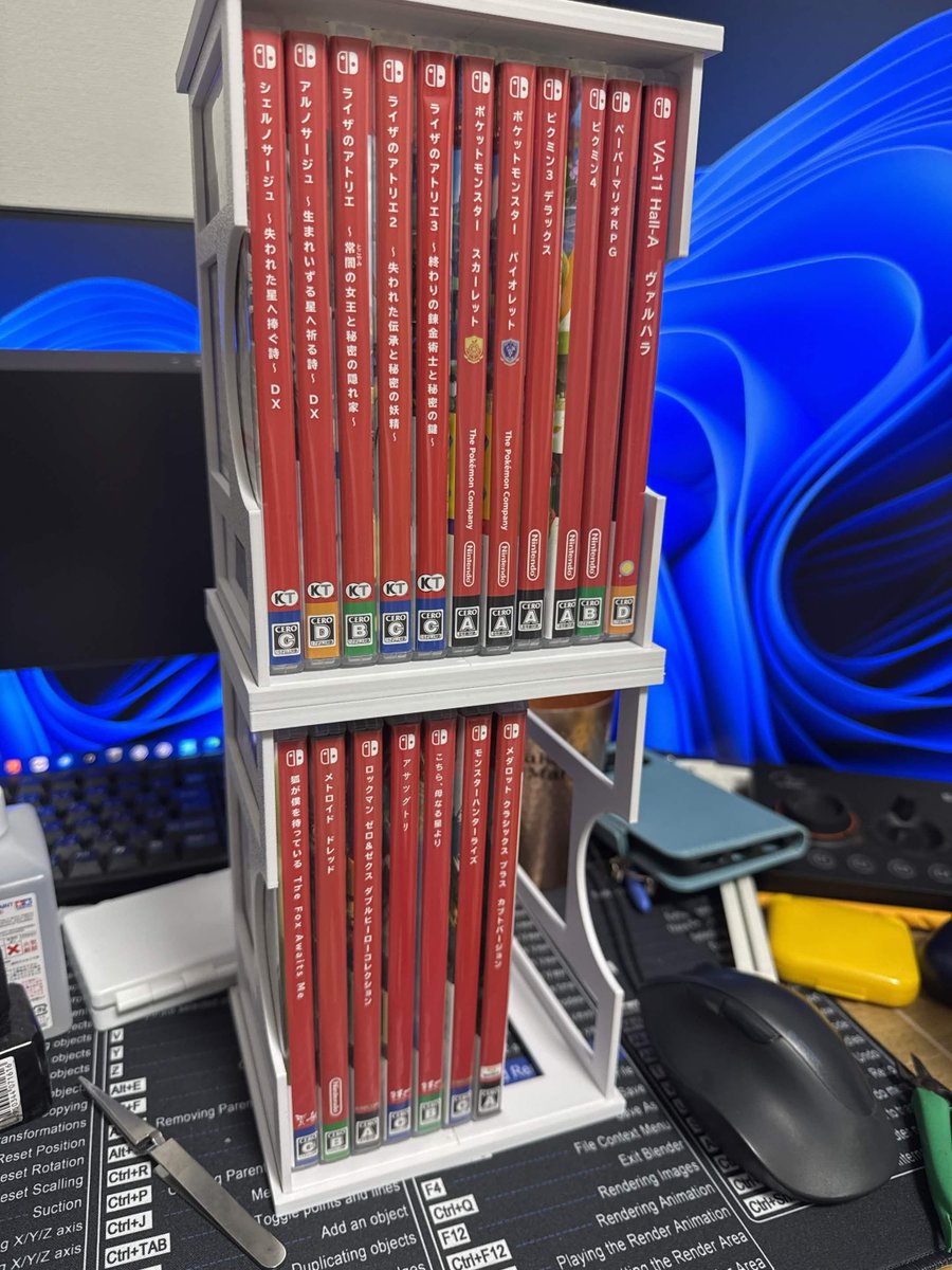 sin_hosaki's tweet photo. 若干寸法ミスってパケの収納容量が11本とか言う気持ち悪いことになったけどぴったり収まるからこれで心置きなくswitchのソフトパケをコンテナにぶち込んでしまいこめるぞ！
#3Dプリンタ https://t.co/DrQUNrEw2S