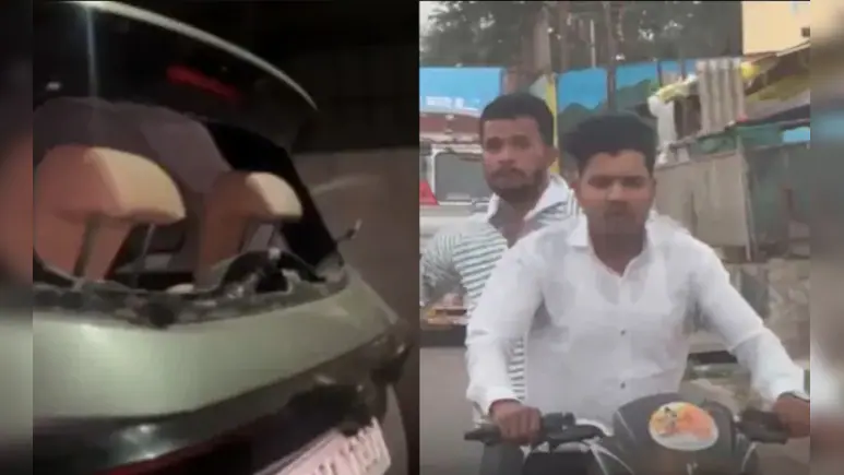ndtv's tweet photo. Video: Man Clings To Car During Chase After Family Was Attacked In Nashik https://t.co/VqqiMct50L https://t.co/N85rNAfAQA