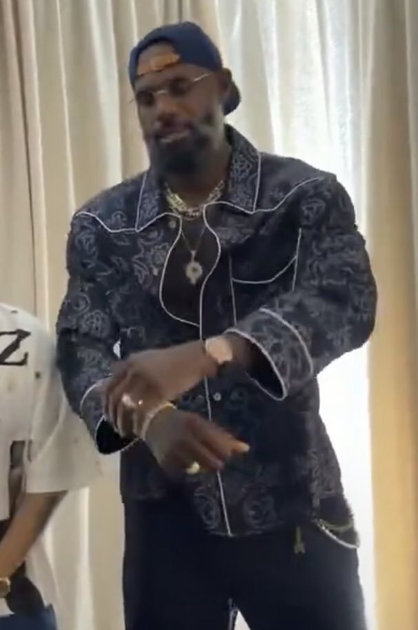 bronverse's tweet photo. the unbuttoned low ass neckline to show off his tits. ok https://t.co/2oxWfx8NJo