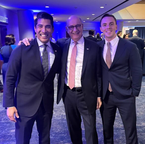 Photo featuring ED Rodriguez and Ambassador Dan Negrea.