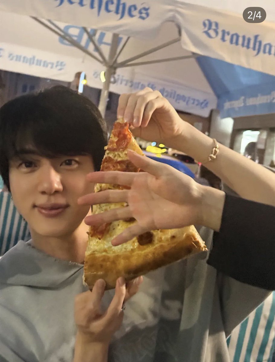 btsredpurple's tweet photo. who’s annoying ass is photobombing Jin &amp; his pizza rn 😭 Jungkook or Jimin https://t.co/aETH692vsj