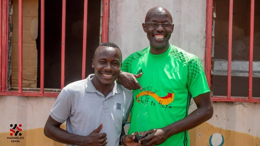 DeedoKenya's tweet photo. We at Maendeleo Kenya were privileged to award Harambee Stars legend Musa "Otero" Otieno, founder of Kick Off to Hope Kenya. His extraordinary dedication to his community and his massive impact on local youth is truly inspiring. Thank you for inspiring today for tomorrow! 🙌. https://t.co/GVj3IPdTEb