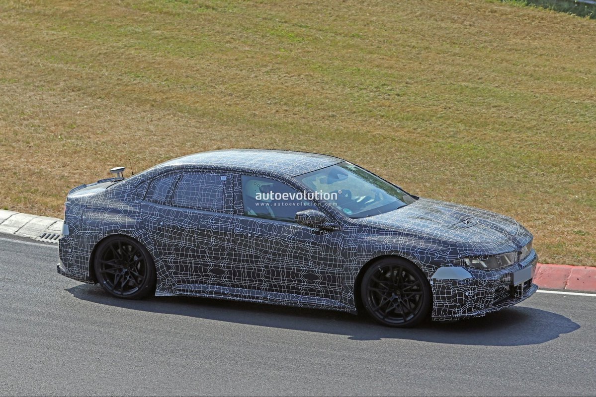 cole_marzen's tweet photo. The battery-electric 2028 BMW M3 has been spied lapping the Nürburgring with Vision Neue Klasse-inspired styling. In addition, the sedan will feature Panoramic Vision, iDrive X, 800-volt technologies, a bespoke battery pack, as well as a quad-motor, AWD powertrain. #BMW #M3 #BEVs https://t.co/BubmHveBTr