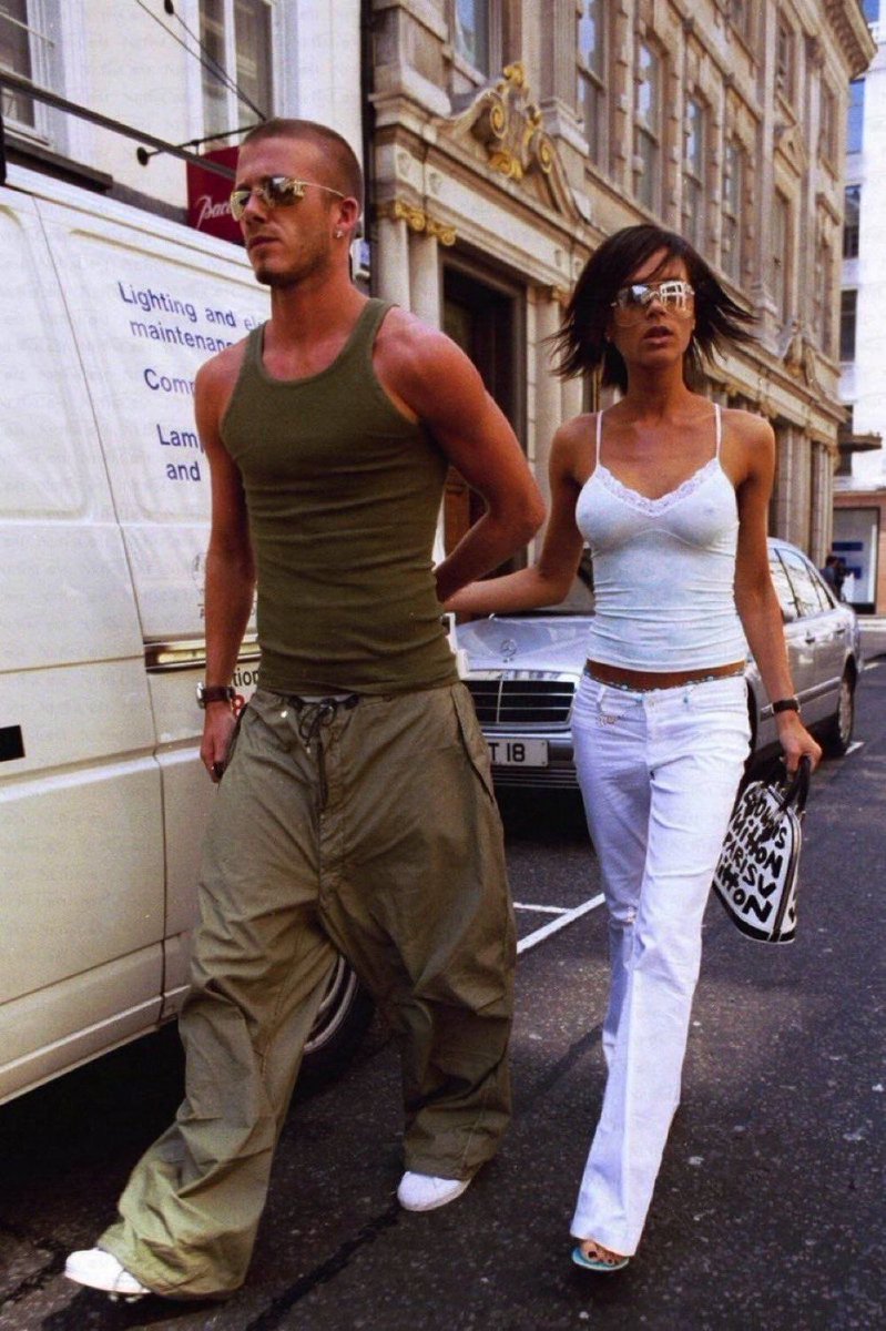 rachcorrine's tweet photo. Icons only. Becks and Posh. My new hyper fixation. Currently watching Beckham documentary. (Yes I am aware I am a year behind. Have never been into soccer (football) Sorry.)) These photos aren’t even scratching the surface in terms of style. But truly. Iconic. Also bags > backpacks.