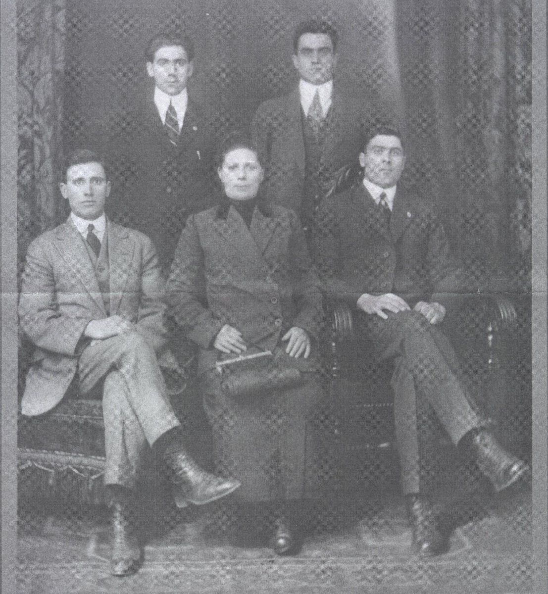 vaxxless's tweet photo. My paternal great grandmother, Mrs Stoika Nikolff Shonteff with her 3 sons; clockwise, Nicholas Shonteff on her right, in the back row is Peter Shontoff my grandpa, (next is a family friend) then on her left is my dad Cyril Shontoff's uncle Christopher Gotzeff. (circa 1912) https://t.co/CfaYsHbYN3