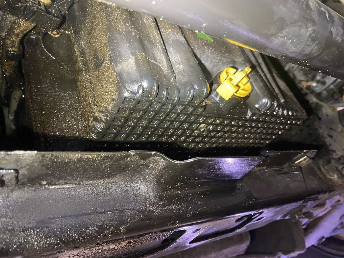 FrankBr05713205's tweet photo. As a veteran automotive technician, I think it’s an outrage and so wrong that a 50K plus vehicle would have a plastic engine oil pan and drain plug! And also plastic transmission pan, valve covers, intake manifold, control arms and so on. About 50 percent of many of today’s vehicles are plastic. Plastic warps, gets brittle and cracks with age and is easily damaged.