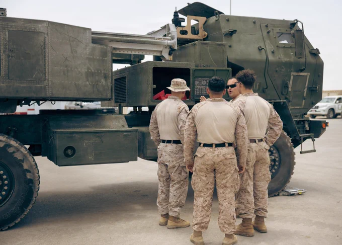 U.S. Marines discuss the weight distribution of an M142 High Mobility Artillery Rocket System in preparation for embarkation in the U.S. Central Command area of responsibility, June 30, 2026. (U.S. Marine Corps photo by Sgt. Antonino Mazzamuto)\n\n