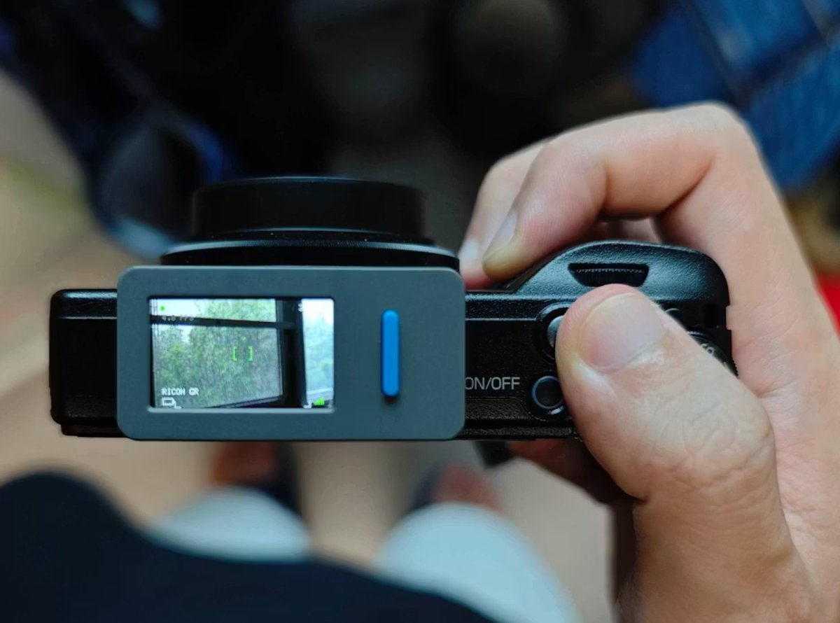 M5Stack's tweet photo. 📷 Pocket-Sized Wireless Viewfinder for Ricoh GR — Frame Every Angle with Ease ✨

Made by ThinkerZhang @ClWZN5Iu2icXq1K built with #M5Stack #StickS3, this open-source wireless monitor brings discreet waist-level framing and remote control to the Ricoh GR IV 📸, making it ideal for street photography 🚶 and geometric urban compositions 🏙.

 📡 Real-time MJPEG Live View over Wi-Fi
 ⚡ Low-latency remote shutter control via BLE
 🖥 Smooth JPEG decoding powered by the ESP32-S3 and PSRAM
 👖 Compact, pocket-ready design with automatic pairing
 🔥 Pre-compiled firmware available through M5Burner, with no coding required

👉 See the full project on https://t.co/pl1RCuGzc9: https://t.co/uDXjuiyNVr

#M5Stack #RicohGR #ESP32S3 #BLE #WiFi #M5StackInnovationContest