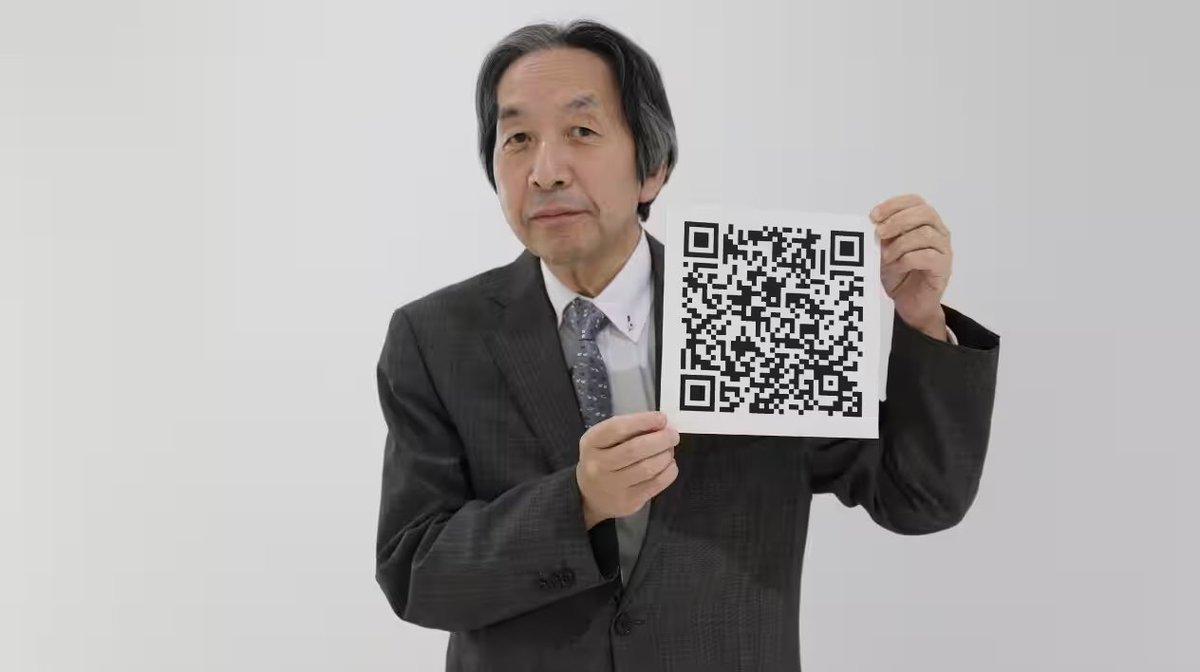 MillieMarconnni's tweet photo. A Japanese engineer invented the QR code for one job, tracking car parts on a Toyota line, then his company chose to give the patent away for free, which is the only reason it ended up on every restaurant table on Earth.

His name is Masahiro Hara. The company was Denso Wave, a parts supplier owned by Toyota.

In 1992 the problem landed on his desk, and it was not glamorous. Workers on the factory floor were drowning.

Every car part had a barcode, but a barcode can only hold about twenty characters, so to track one component they had to stick five or ten barcodes on it.

A worker would stand there scanning a single part ten times in a row. Some of them were scanning close to a thousand barcodes a day. The job had stopped being about building cars and turned into pointing a scanner at stickers all day long.

And there was a second problem nobody upstairs cared about. This was a factory. Oil got on everything. A smudge of grease across a barcode and the whole thing became unreadable, and the line stopped.

Hara was asked to make the scanner faster. He looked at it for a while and realized the scanner was not the problem. The barcode itself was the ceiling. A line of black bars can only hold information going one direction, left to right.

He decided to build something that held information in two directions, up and down as well as across, so it could store hundreds of times more in the same little square.

Then came the part that sounds made up but is not.

Hara played Go on his lunch breaks, the old board game with black and white stones sitting on a grid. He was staring at the board one day and it clicked.

The grid of black and white stones was already a way to store information in two directions. That was the shape of his code.

But building the code was the easy half. The hard problem was speed, because the whole point was to be fast, and a scanner wastes most of its time just trying to figure out where the code is and which way it is turned.

The fix came to him on a train. He was looking out the window at buildings, and one building stood out from all the others because of its shape against the sky. That was the idea.

He put three little square targets in three corners of the code. The moment a scanner sees those three squares, it knows instantly where the code is and how it is rotated, even upside down, even at an angle.

Now here is the detail that shows how far he was willing to go. Those three corner squares only work if nothing else on the page looks like them.

If a magazine ad or a cardboard box happened to have the same black and white pattern nearby, the scanner would get confused and grab the wrong thing.

So Hara and his tiny two-person team went and surveyed printed material. Magazines. Flyers. Cardboard boxes. Piles of it, for days, reducing every picture down to its ratio of black to white area, hunting for the one ratio that almost never shows up in print anywhere. They found it. One to one to three to one to one.

That exact rhythm of black and white is baked into every corner square of every QR code on Earth, and it is there because it is the pattern the printed world almost never produces by accident.

Then he solved the oil.

He built the code so it carries a backup of its own information, spread mathematically across the whole square. You can tear off, smudge, or scratch out up to thirty percent of a QR code and it still scans perfectly, because the code rebuilds the missing piece from the copy it kept of itself.

A worker could get grease on a third of the label and the line would keep moving. This is the same math that lets a scratched CD still play and lets a spacecraft send data back across the solar system without asking to repeat itself.

He finished in 1994. He named it Quick Response, after what it does for the person using it, not after what it is.

And then Denso made the decision that actually mattered.

They held the patent. They could have charged a fee on every single scan, and given how many billions happen now, that would have made someone unimaginably rich.

Instead they announced they would not enforce their rights to collect royalties, and they published the specification openly so anyone could use it. Hara later said it was not even a big argument inside the company.

That one choice is the whole story. A code that costs nothing to use is a code everyone builds on. Airlines put it on tickets. Phone makers built readers into cameras.

Then a pandemic hit and the world needed a way to hand someone information without touching anything, and the free little square that a Toyota engineer built for greasy factory workers was suddenly on every menu, every payment, every door.

Hara still works there. He has said, more than once, that he never imagined it would spread this far, and that the part he is proudest of is that it got used to keep people safe.

The man built it to survive oil on a factory floor. It ended up surviving everything else too.

You have scanned his work a hundred times this year. Now you know whose it was.