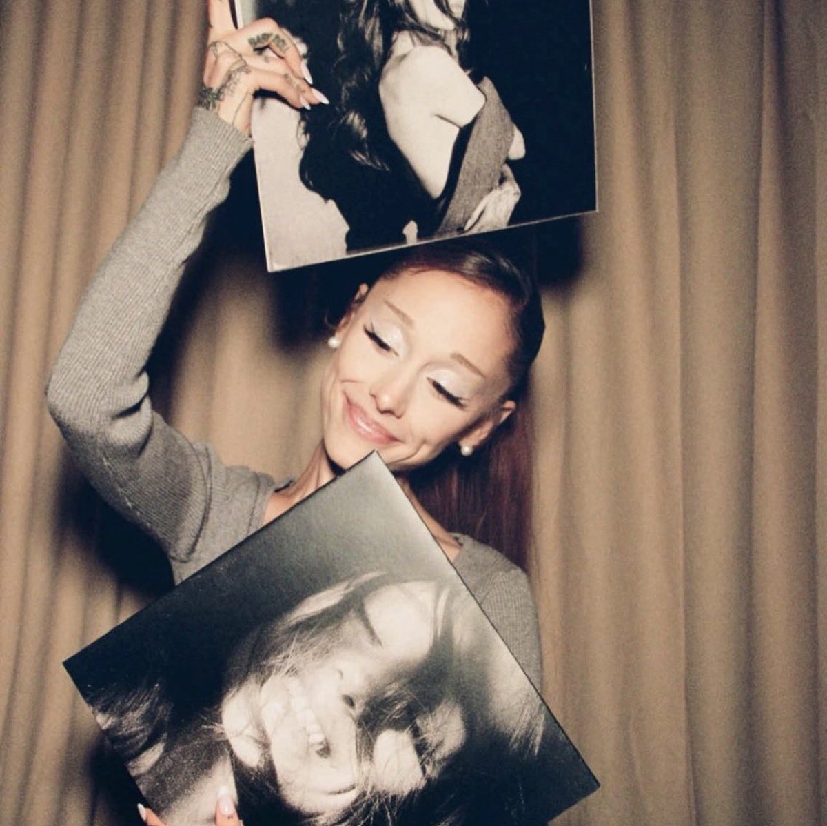cartierbry's tweet photo. these being the only albums we have pictures of ariana holding https://t.co/86vdXfgJkf