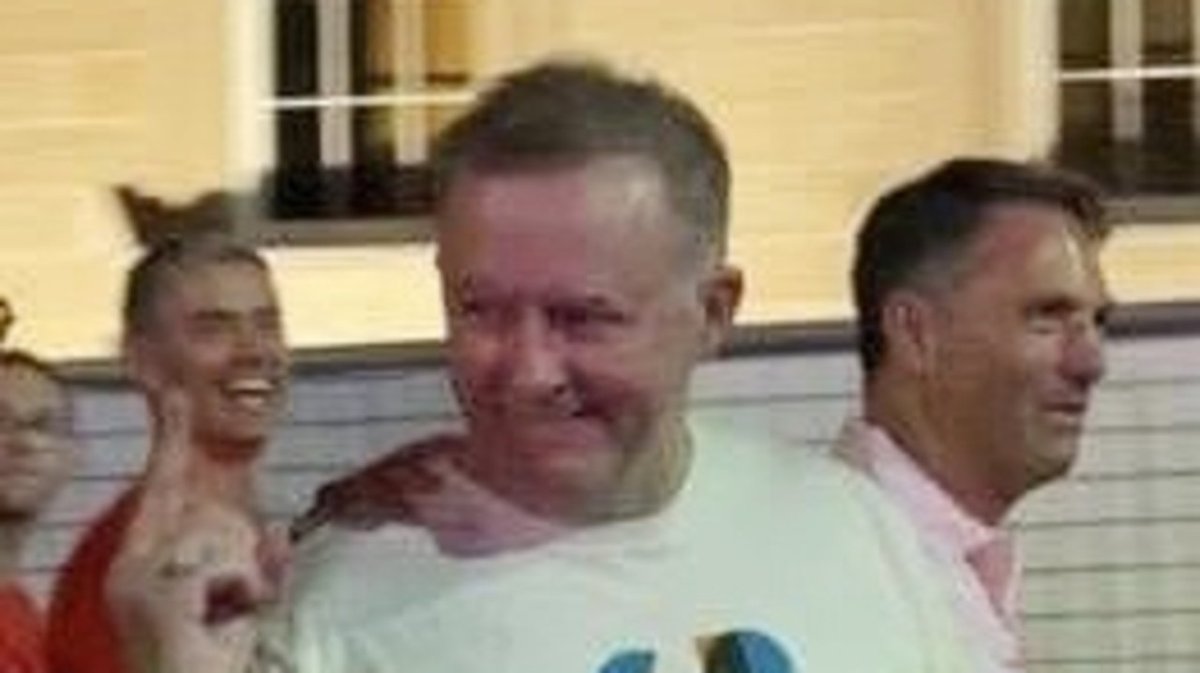 GuardianOfKarma's tweet photo. Here's hardly ever seen footage Anthony Albanese wants wiped off the internet &amp; has almost succeeded in doing so. 
In 2020 at a Mardi Gras march (of course) Anthony Albanese stuck his finger up at protesters. 
This is Albanese showing  his true colours, that being rainbow. https://t.co/yF9VklGTVb