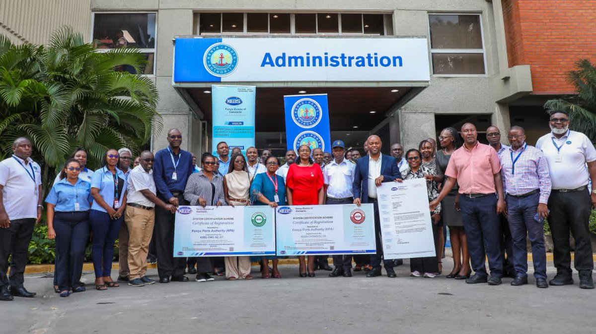 Kenya_Ports's tweet photo. Kenya Ports Authority has recorded another milestone following the attainment of two new international certifications that reinforce its commitment to environmental management and workplace safety across its port facilities.

The Authority was awarded ISO 14001:2015 for Environmental Management Systems and ISO 45001:2018 for Occupational Health and Safety Management Systems. 

The certifications affirm KPA's adoption of globally recognized standards aimed at promoting sustainable operations, protecting the environment and enhancing the safety and wellbeing of employees and stakeholders.

Speaking during the presentation of the certificates in Mombasa, Kenya Bureau of Standards (KEBS) Managing Director Esther Ngari said the achievement marked a significant milestone in KPA's journey towards operational excellence and sustainable growth.

Ngari noted that KPA has maintained ISO 9001 certification since 2010, demonstrating more than a decade of commitment to quality management and customer-focused service delivery. 

She said the Authority has consistently embraced internationally recognized best practices to deliver efficient, timely and reliable port and logistics services.

"Today's certification to ISO 14001 and ISO 45001 therefore represents a natural progression in KPA's excellence journey," she said, adding that the Authority had evolved from focusing on quality management to embracing an integrated approach where quality, environmental stewardship and occupational health and safety are managed as strategic priorities.

She described the achievement as the hallmark of a world-class port authority and said KPA had established a benchmark for public sector excellence in Kenya and across the continent.
Ngari further noted that the Port of Mombasa serves as the gateway to East and Central Africa and that improvements in KPA's systems have a positive impact on regional trade and logistics corridors serving countries including Uganda, Rwanda, South Sudan and Burundi.

On his part, the Kenya Ports Authority Chief Executive Officer Capt. William Ruto said the certification crowns years of hardwork, resilience and adaptation at the port.

He added that the recognition reflects KPA's transformation journey over more than a decade.
Capt. Ruto thanked KEBS for supporting the process and said the Authority was deeply honoured to receive the Environmental Management System and Occupational Health and Safety Management System certifications.

Ruto lauded the introduction of ISO standards saying it had transformed how KPA works by strengthening systems and discipline, helping the port respond better to the ever dynamic operational demands.

"The reforms we are witnessing were driven by the realities KPA faced in the early 2000s, when rising cargo volumes, outdated infrastructure, manual processes and growing safety and environmental risks threatened the port's ability to evolve into a more resilient and globally competitive maritime gateway," he added.

The two leaders termed the certification as both a validation of past reforms and a platform for deeper progress for the gateway to East and Central Africa.