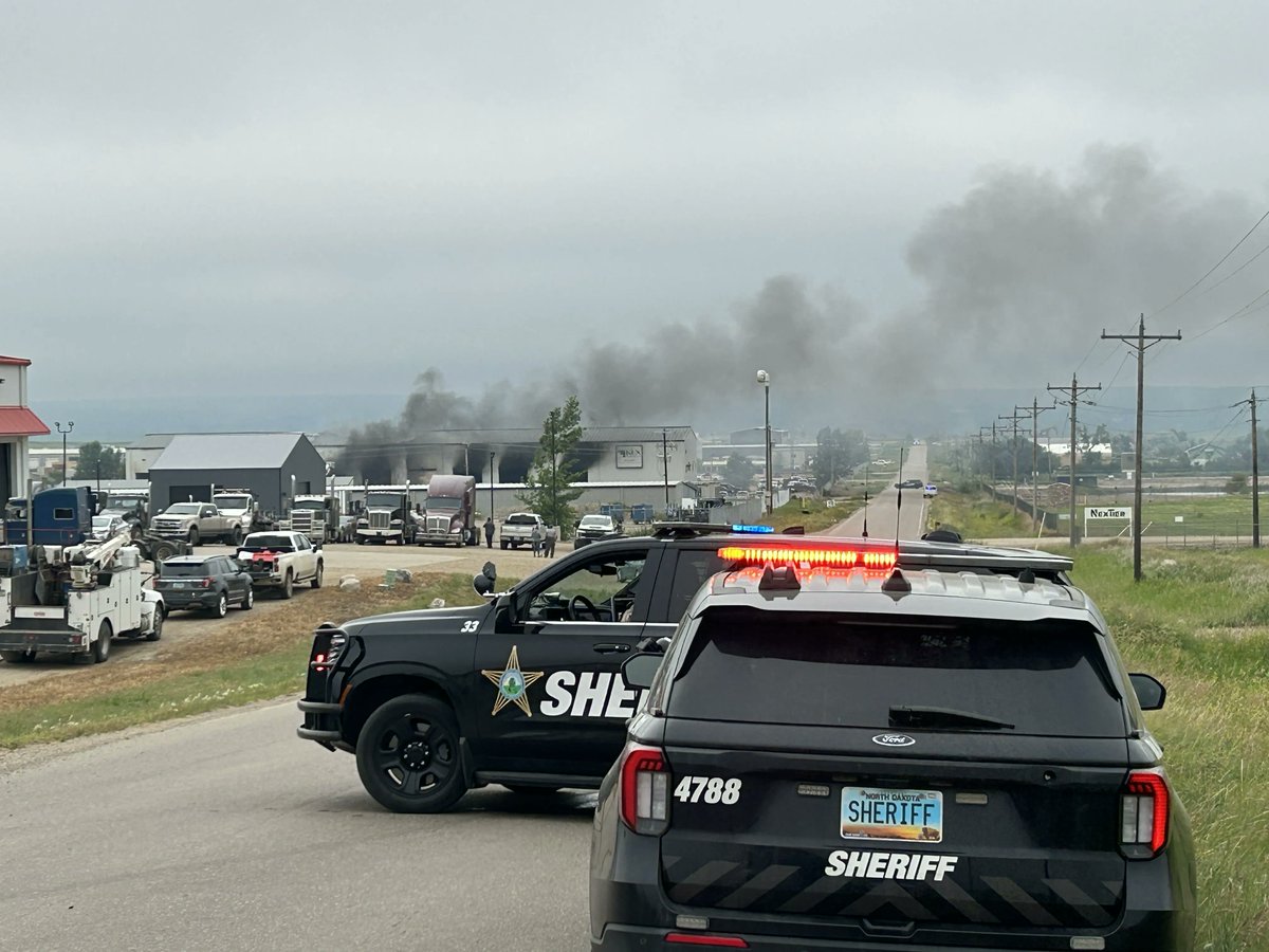 willistonherald's tweet photo. Fire crews work at an industrial fire at KLX Energy Services in the Missouri Ridge Commercial Park north of Williston Thursday morning. Keep an eye on https://t.co/CVpABnjdDU for more details. https://t.co/1Q7debgQwA