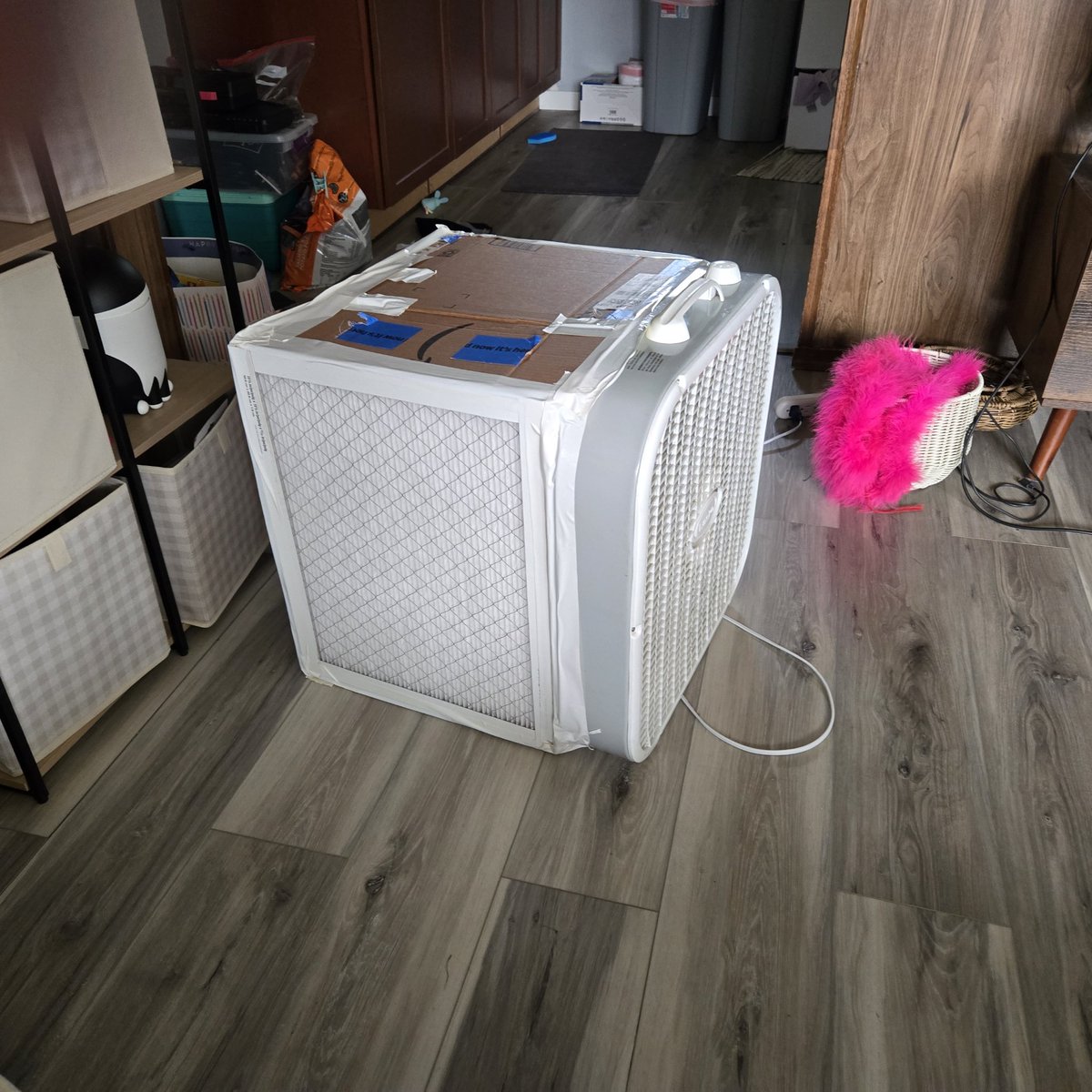fauxmantis's tweet photo. If you're currently affected by the wildfire smoke, please remember you can make an air filter with MERV 13 hvac filters and a box fan. This one cost me $40 to make. it has two filters, the rest of the sides are cardboard. You can also just tape 1 filter directly to the back. https://t.co/vU5DAAmd3G