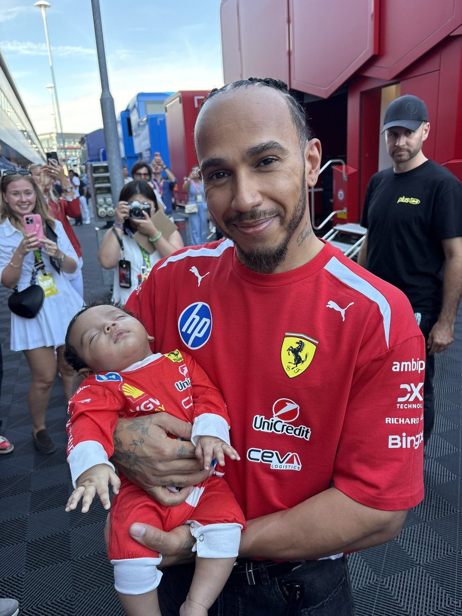 mercedarri's tweet photo. lewis hamilton being given babies like he’s the pope is my favorite genre of photos https://t.co/ZTvVmBqqy7