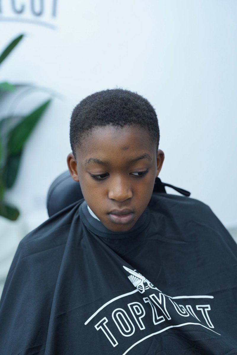 Topzycut's tweet photo. His mom knew exactly where to bring him for his graduation haircut https://t.co/97fAKM8bS7