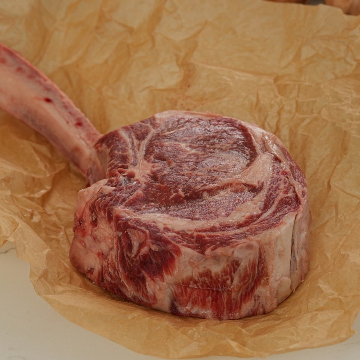 7XBeef's tweet photo. The kind of steak people remember.

Hand-trimmed around a primally perfect rib bone, our Tomahawk Ribeye delivers exceptional marbling, buttery tenderness, and bold flavor. 

Shop 7X Tomahawk Ribeye here: https://t.co/M5zx8fETL4 

#7xwagyu #7xbeef #tomahawkribeye https://t.co/bHJKIZkp6g