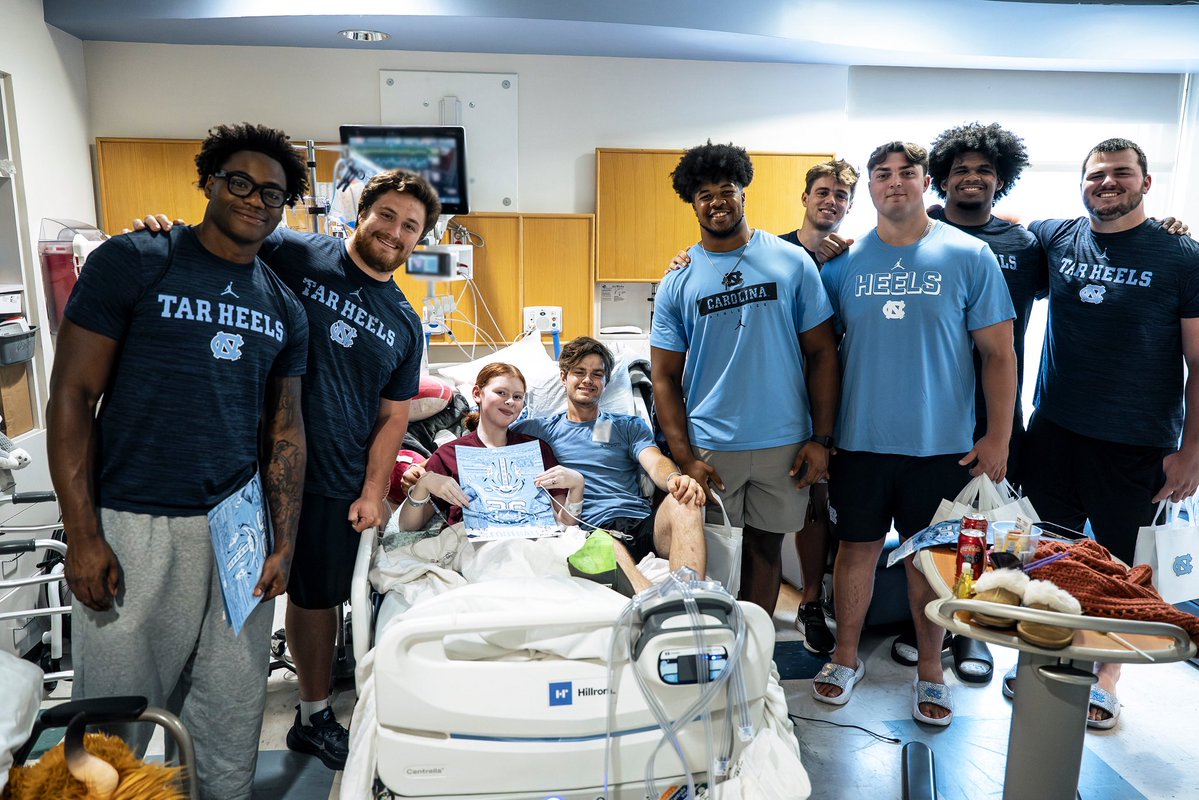 UNCFootball's tweet photo. Enjoyed catching up with our friends over at the UNC Children’s Hospital 🩵 https://t.co/rxczGrojlO